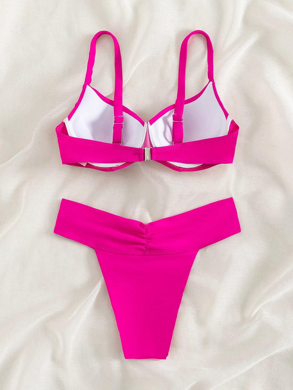 Women's solid colour bikini swimsuit with sleeveless top and briefs bottoms