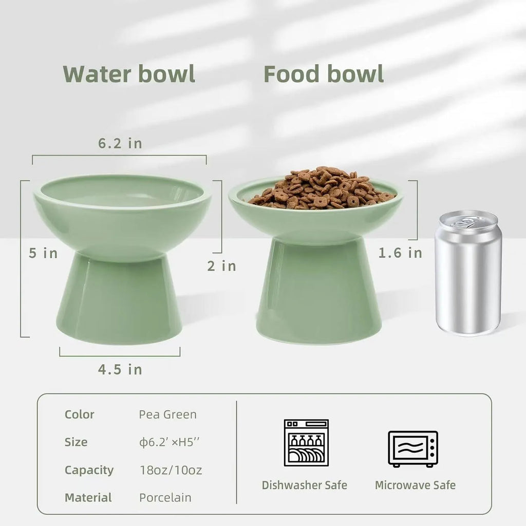 Blue ceramic elevated cat food bowl with wide shallow dish on a white surface.