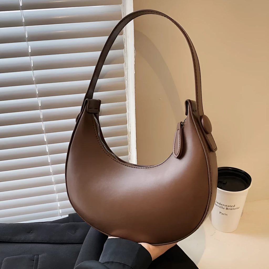 Retro dumpling-shaped women's shoulder bag in PU leather with sandwich pocket design