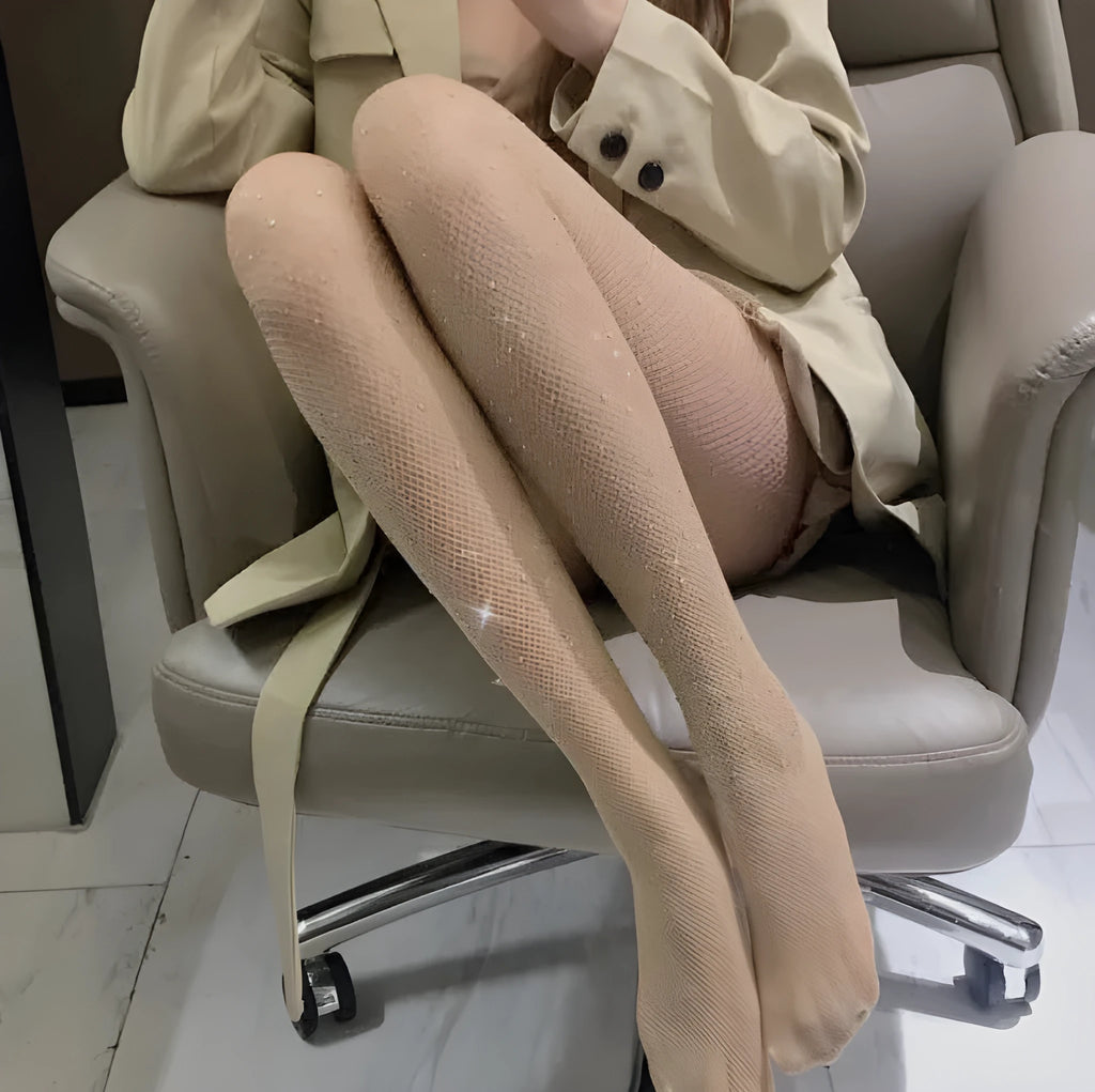 Women's fishnet stockings with diamond mesh pattern in skin, black, or white colours