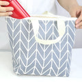 Grey arrow print makeup bag made from moisture-resistant polyester measuring 18cm long