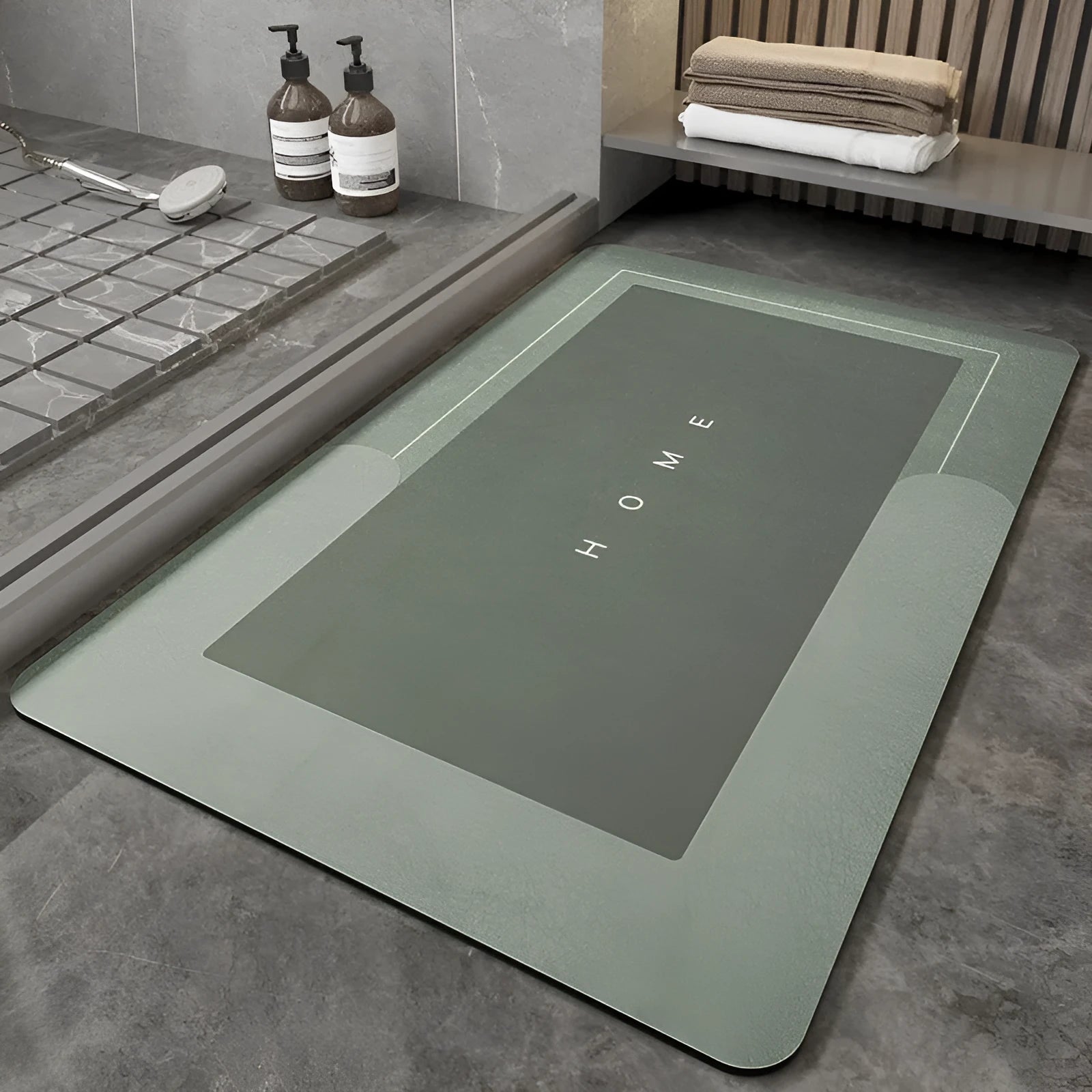 Blue oval blended bathroom floor mat on tiled floor next to a bath.
