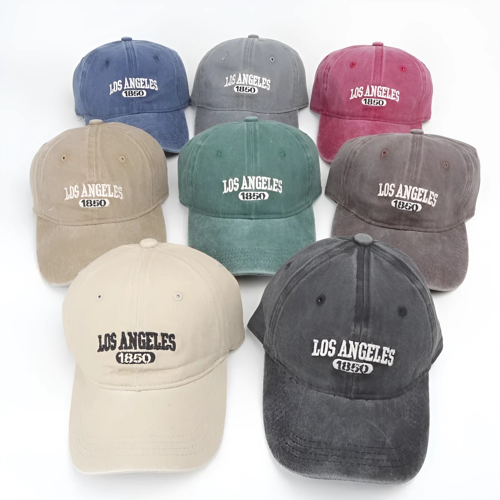 Retro-style adjustable acrylic peaked cap with embroidered letters, shown in a distressed beige colour.