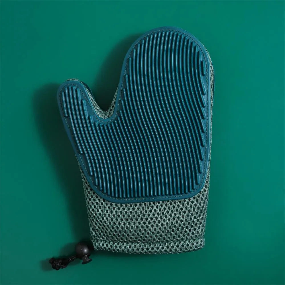 Dark blue pet grooming glove with TPR rubber brush nibs for removing dog and cat hair.