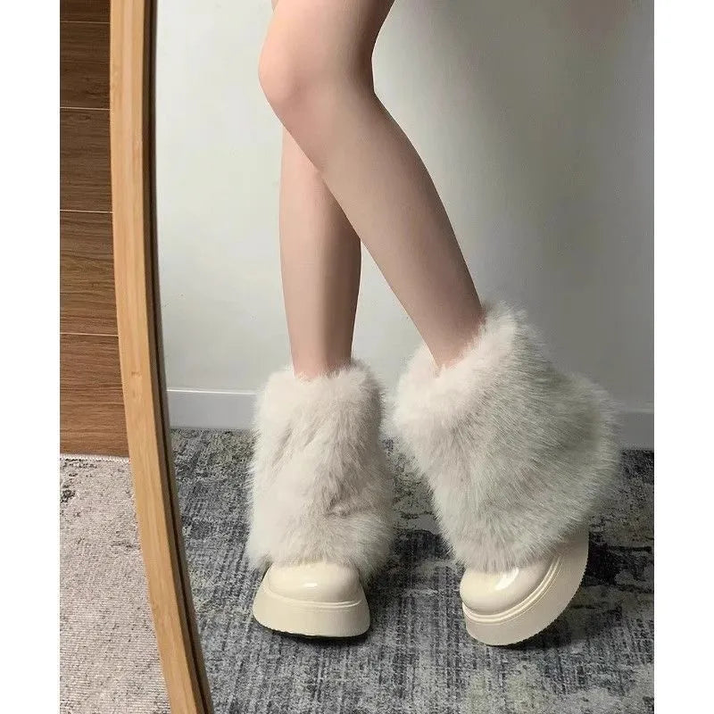 Women's artificial plush snow boots with fleece lining and waterproof platform sole in black or white