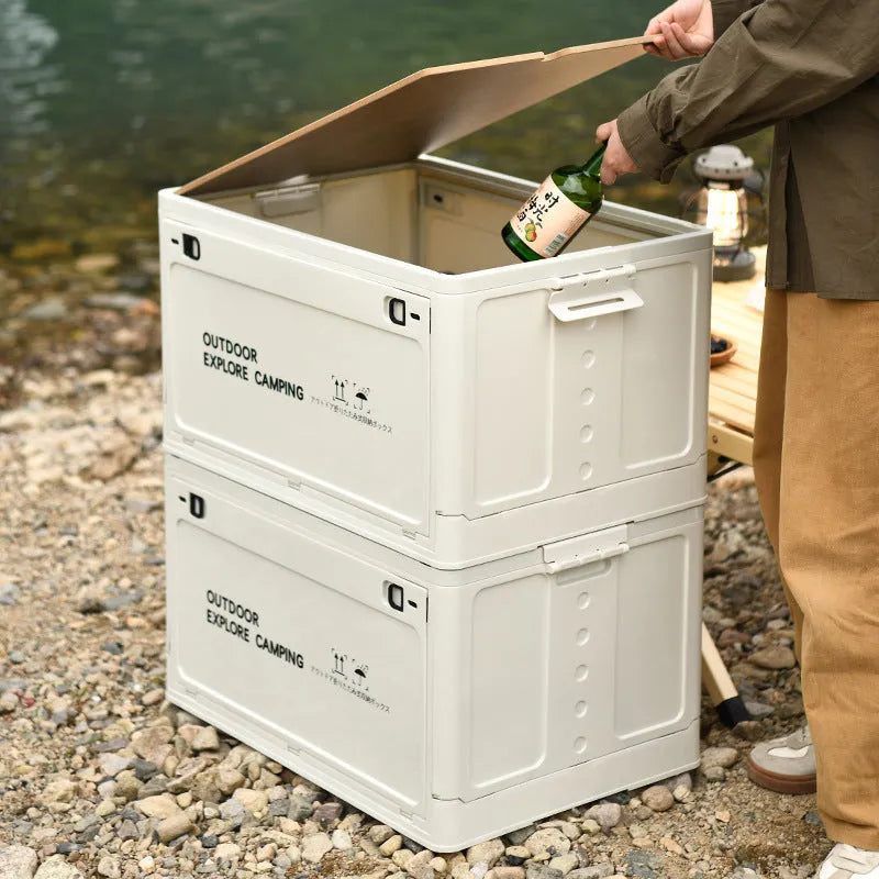Large white plastic storage box with wooden lid, shown open, for household organisation.
