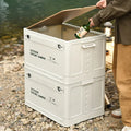 Large white plastic storage box with wooden lid, shown open, for household organisation.