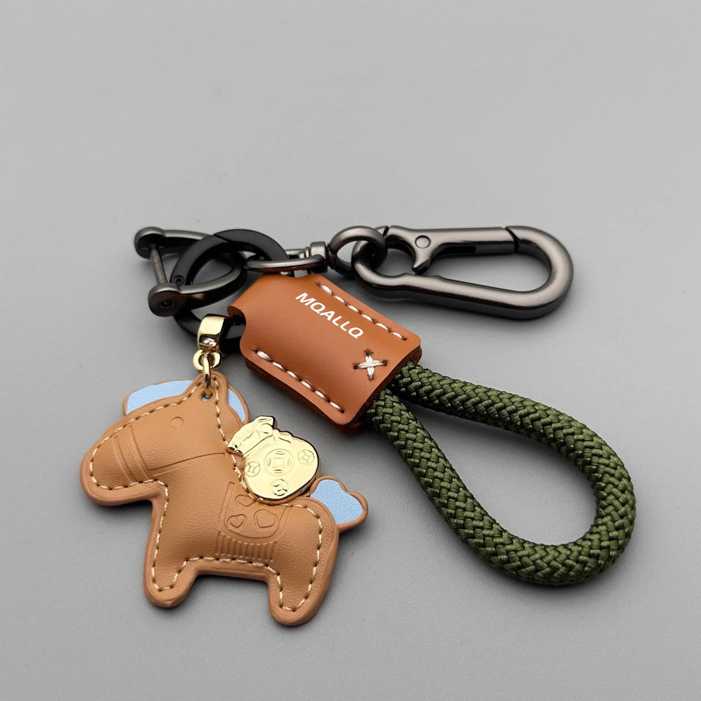 Handmade car keychain with a zinc alloy pony charm on a cowhide cord, shown in multiple colour options.