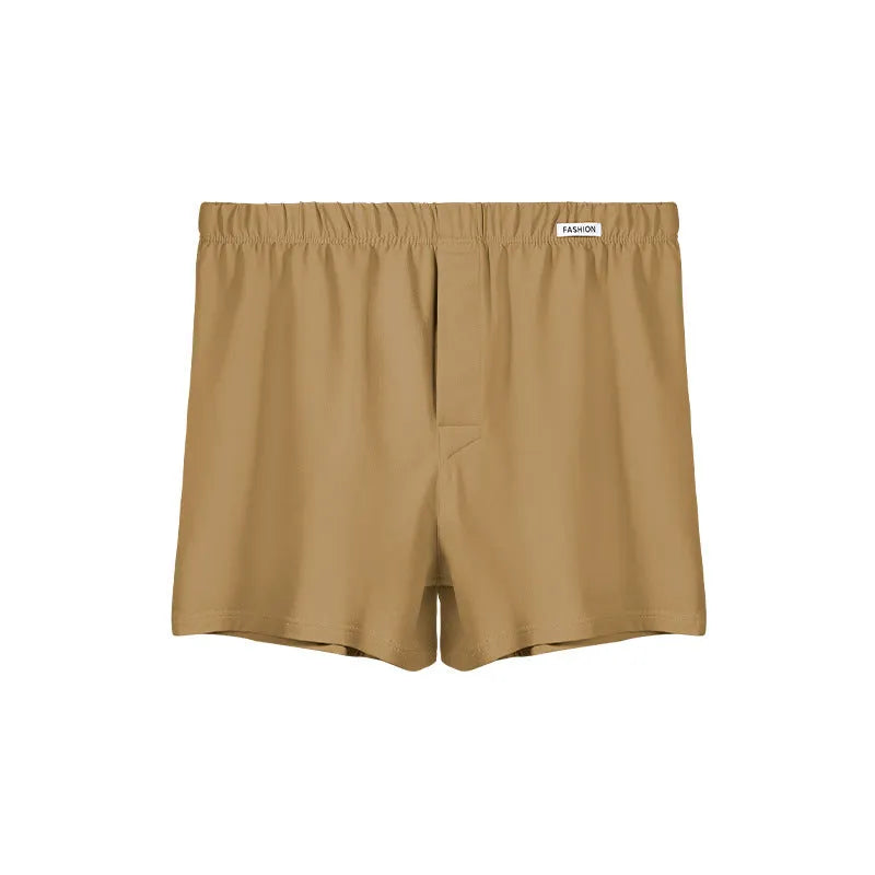 Men's loose-fitting cotton boxer shorts in gold, green, sea blue, and light grey solid colours.