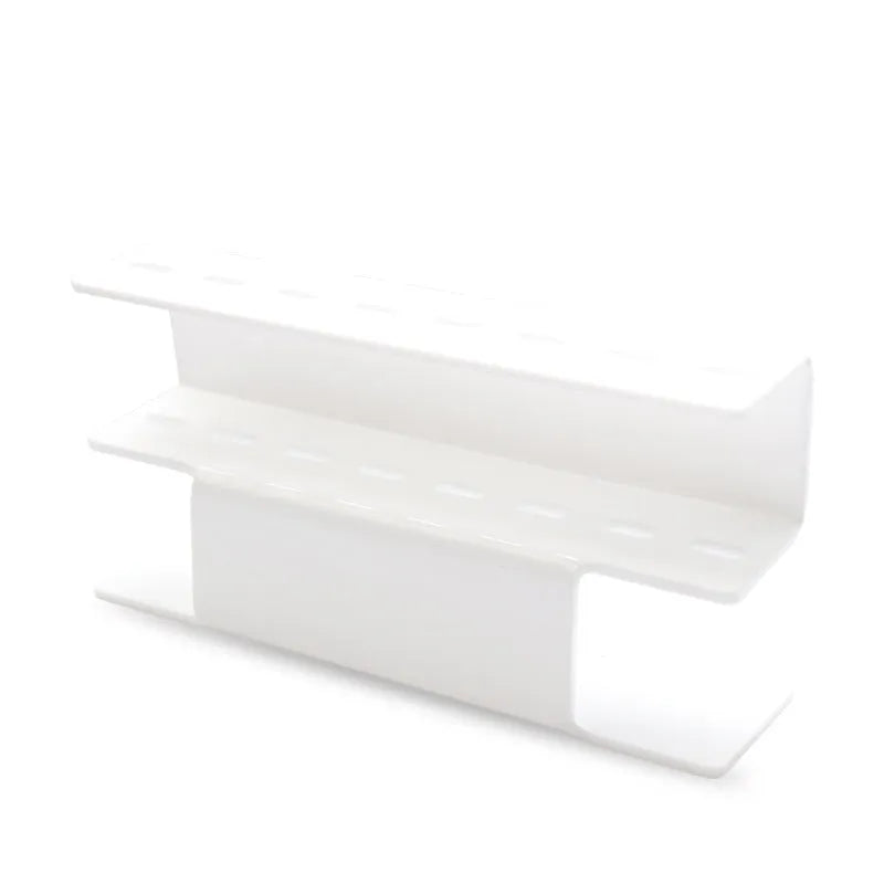 Acrylic tweezers display stand in white finish holding multiple tweezers upright