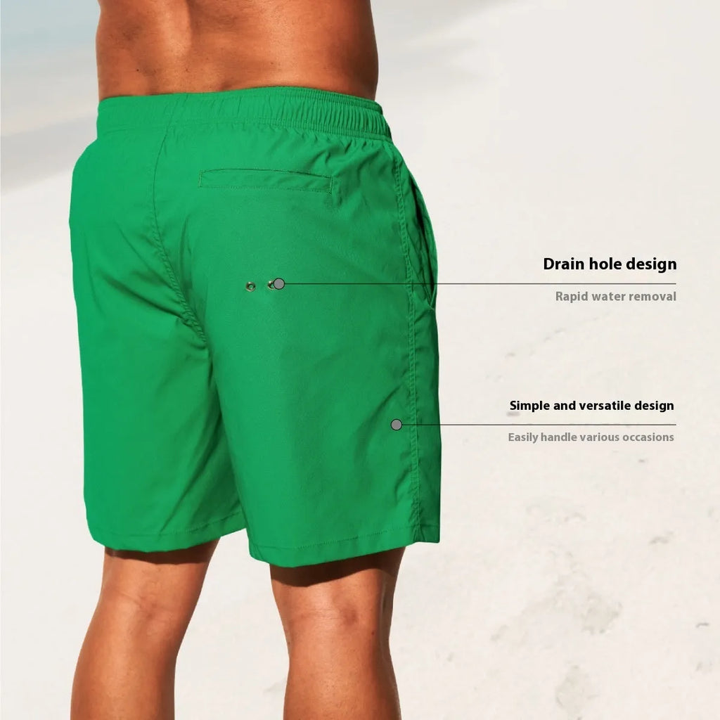 Men's quick-drying nylon beach shorts in blue, shown laid flat, with straight-leg style and elastic waist.