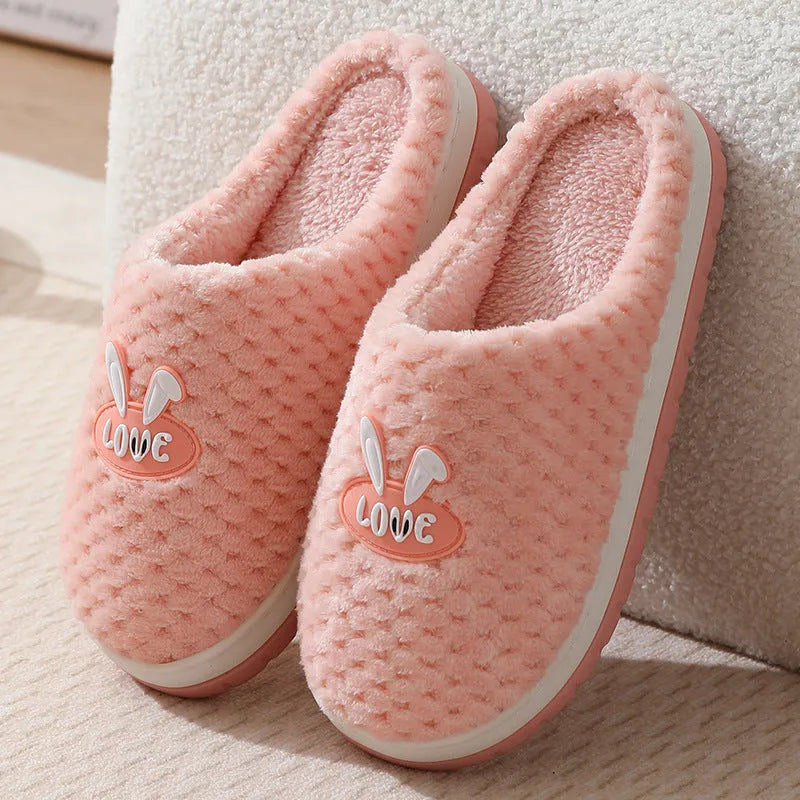 Women's rabbit plaid artificial fur house slippers with a thick rubber non-slip sole in a selection of colours.