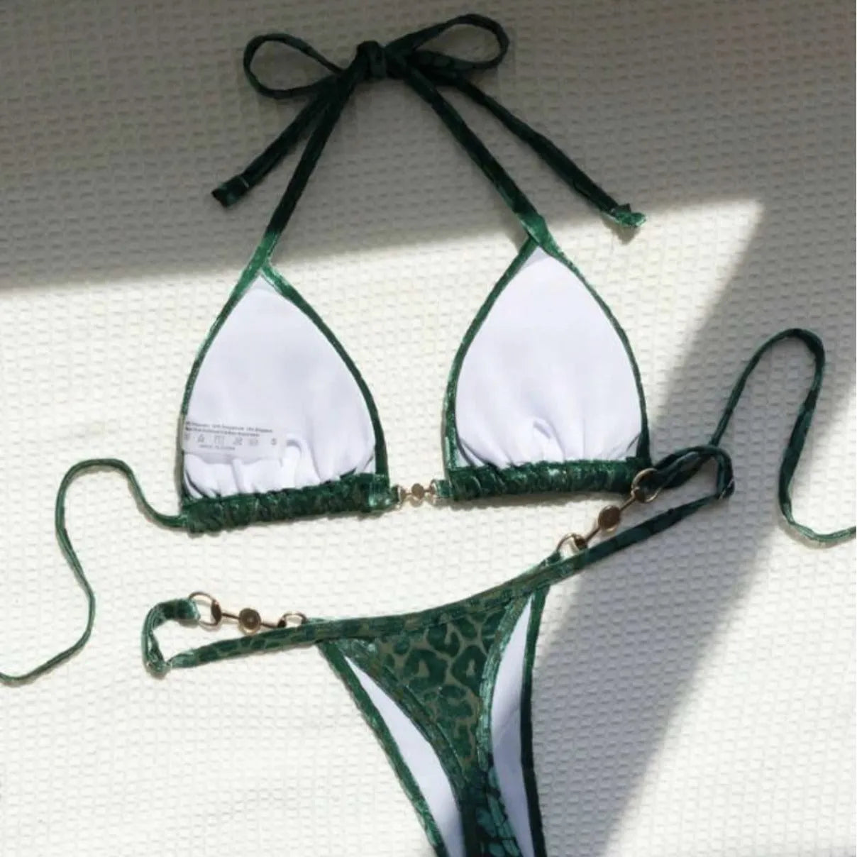 Women's leopard print bikini set with T-shaped design in polyester spandex fabric
