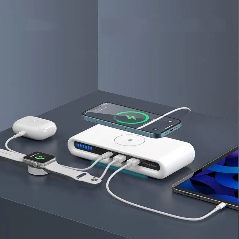 White desktop wireless charger with RGB atmosphere lighting showing phone charging on pad