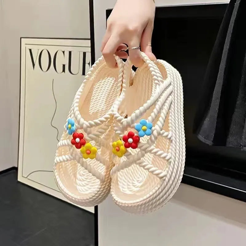 Women's PVC sandals with floral embroidery and non-slip soles in beige or black colours