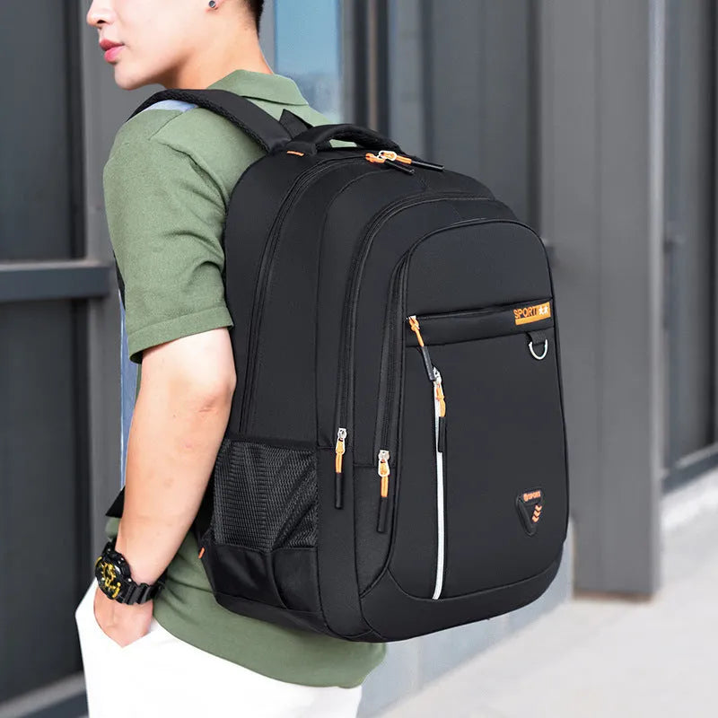 Men's Oxford cloth schoolbag in black with a large main compartment and an air pillow shoulder strap.