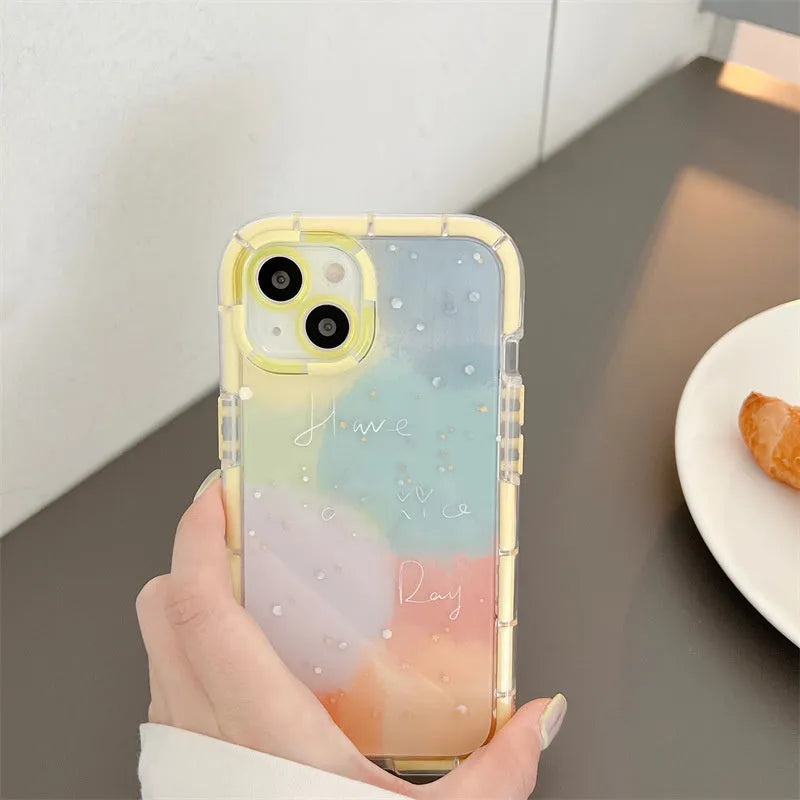 Minimalist iPhone case with a yellow edge on a phone, showing its slim TPU construction.