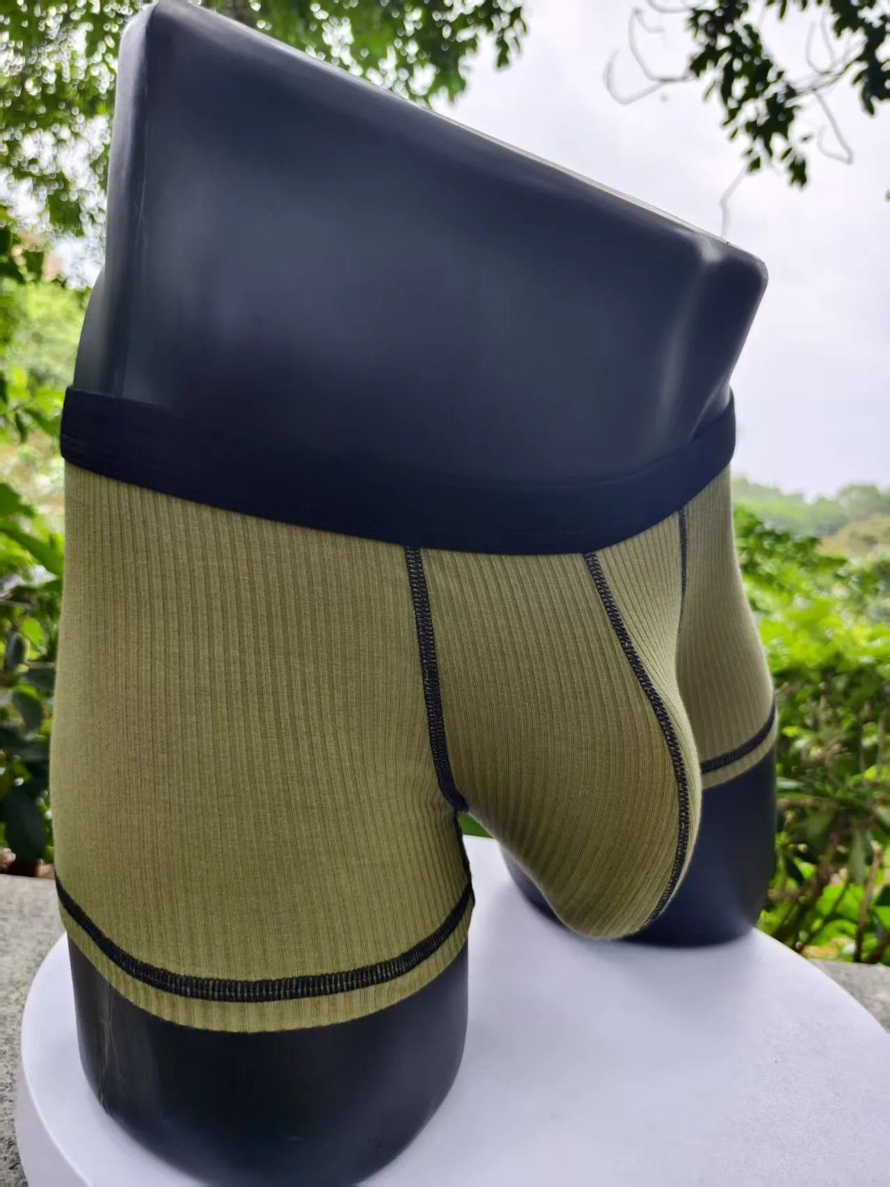 Men's solid colour breathable boxer shorts showing body shaping design in five colour options