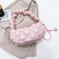 Women's simple nylon cloud underarm messenger bag in a solid colour with an adjustable shoulder strap.