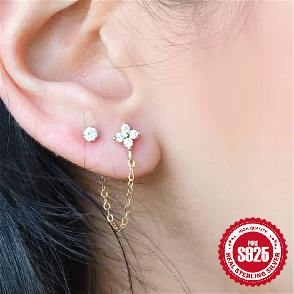 S925 sterling silver stud earrings with flower, tassel, and chain design in gold electroplated finish.