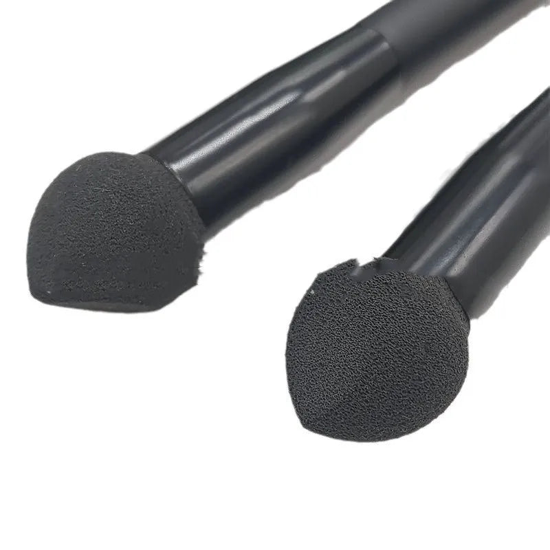 Black sponge stick concealer brush with wooden handle for makeup application