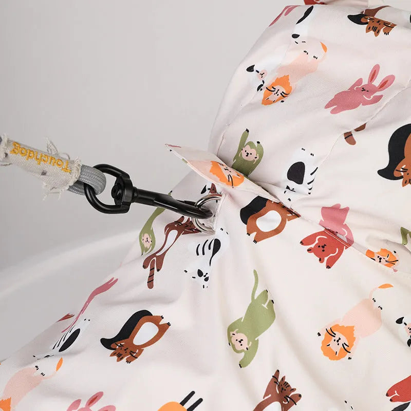 Beige dog raincoat with cartoon design in waterproof PU material