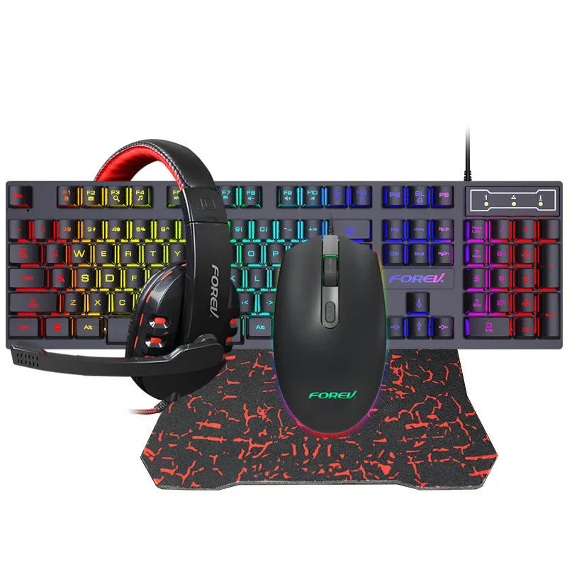 Four piece wired keyboard mouse headset set with mouse pad on desk