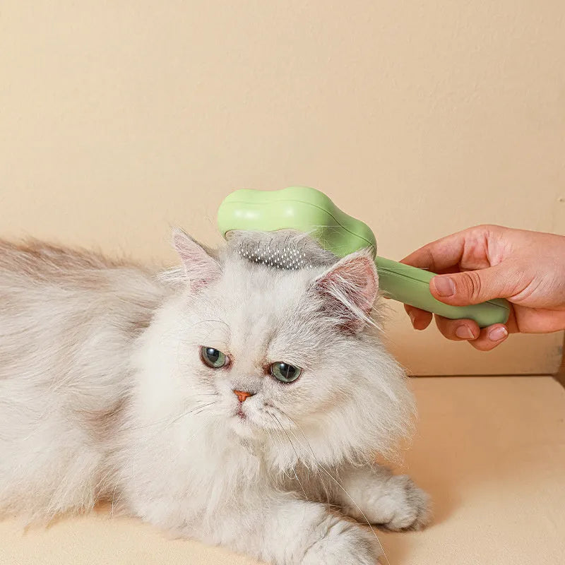 Self-cleaning cat comb with stainless steel needles, green colour, 20cm long pet grooming tool