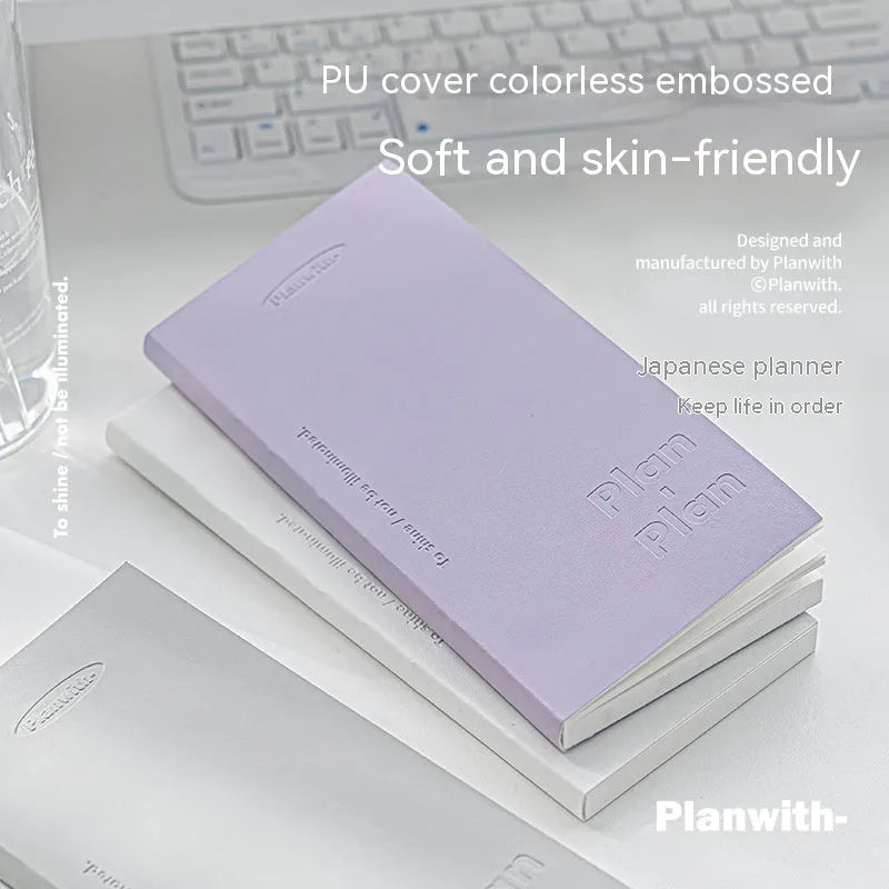 Embossed visual daily meter book with paper cover showing colour options and 80-page interior