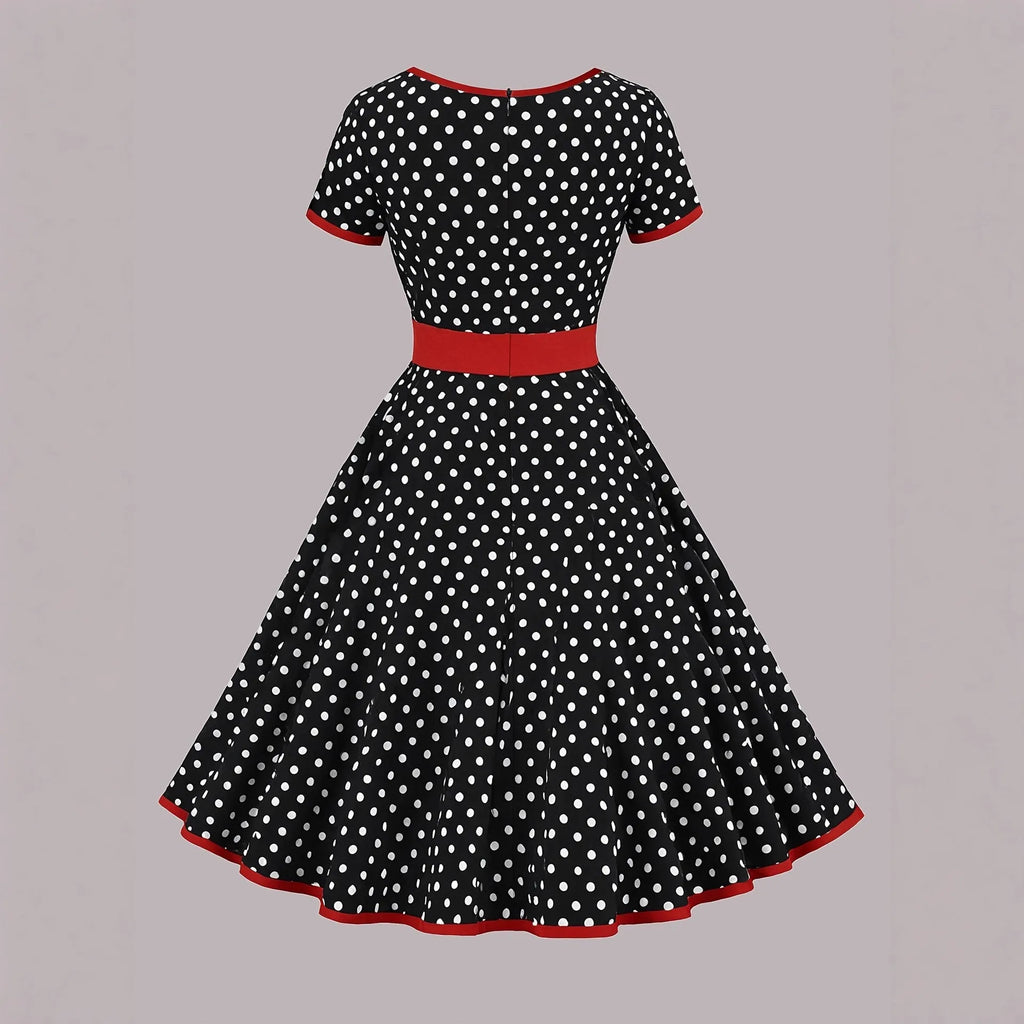 Women's square collar short sleeve dress with polka dot print, front zipper, and pleated mid-length skirt.
