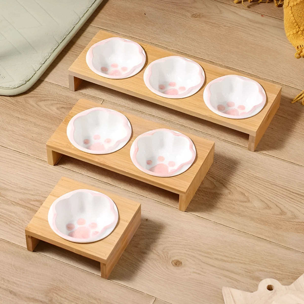 Raised pet bowl with bamboo frame and hand coloured ceramic bowl for cats and small dogs in blue, pink or yellow