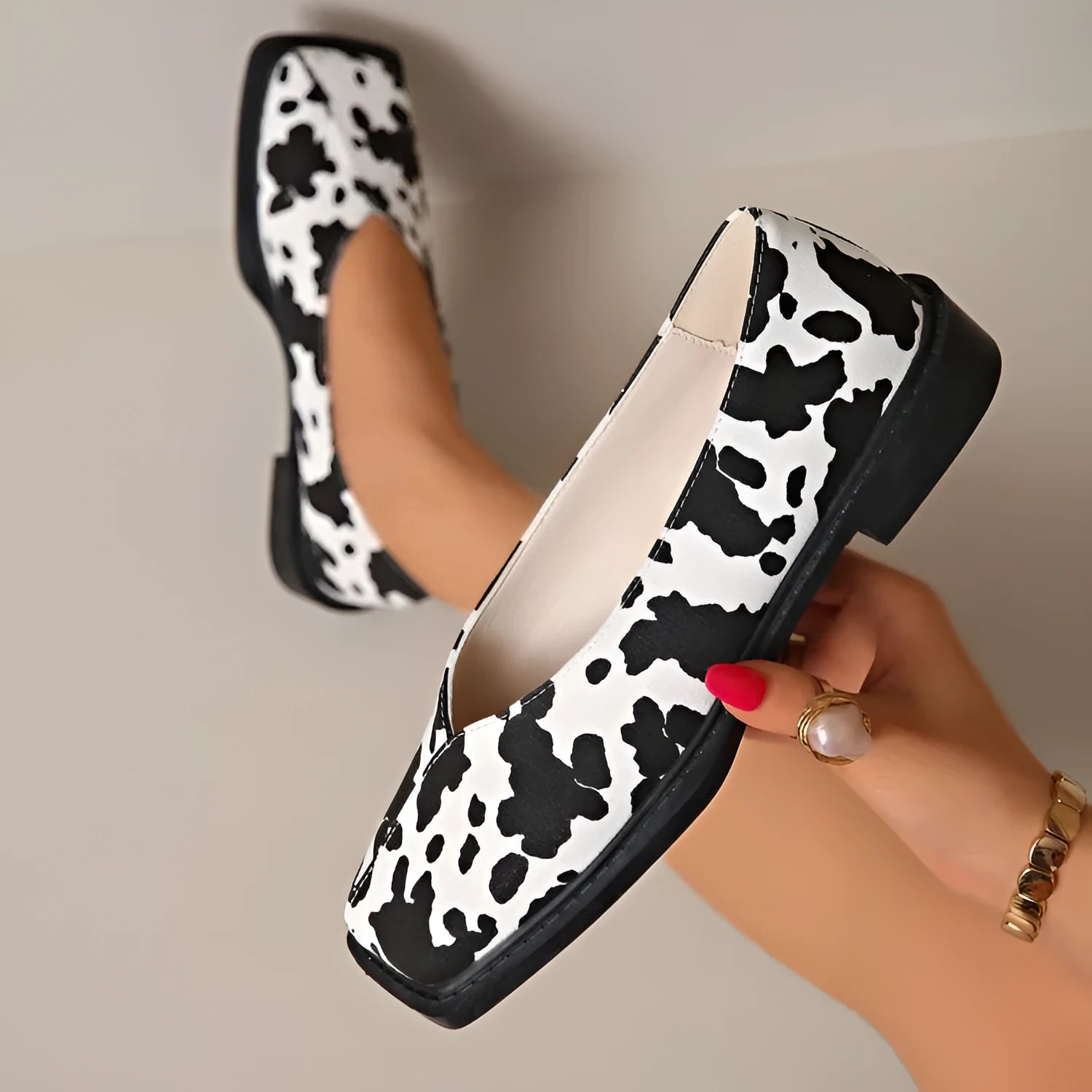Women's cow pattern flat shoes with wedge heel in black and white, first layer cowhide upper