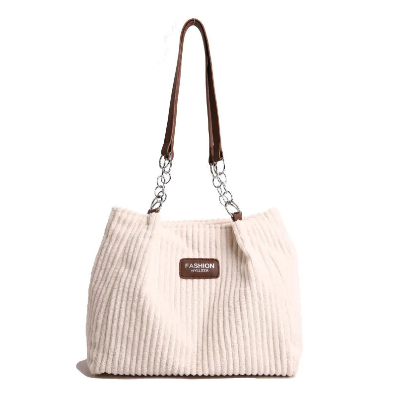 Large corduroy underarm tote bag for women with double straps, horizontal square shape, and splicing detail