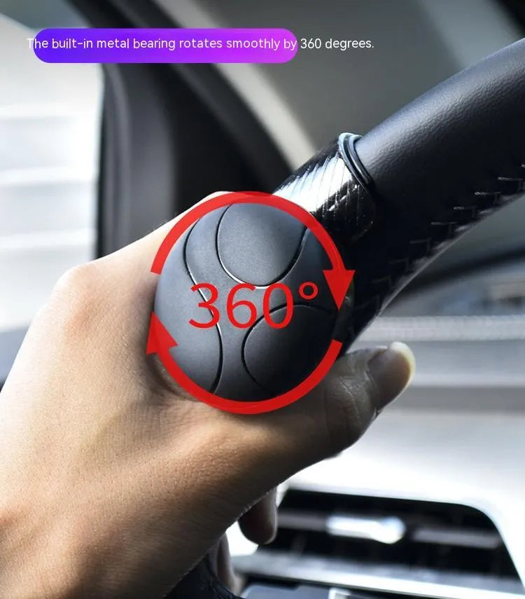 Black silicone steering wheel assist ball with metal bearing booster for single-hand driving