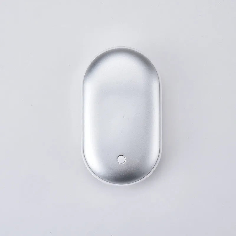 Blue digital display rechargeable hand warmer and USB power bank showing compact size