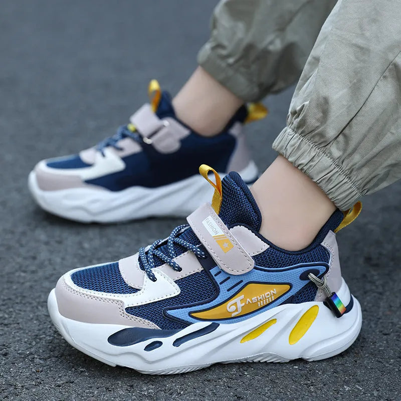Boys' dark blue and light blue sports running shoes with Velcro strap and mesh upper.