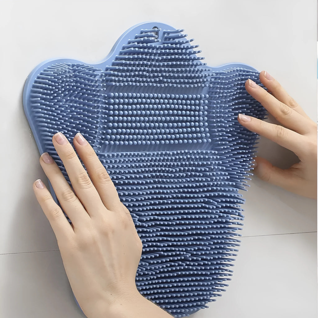 Blue silicone bath rub cushion massage mat for back scrubbing, shown with soft bristles.
