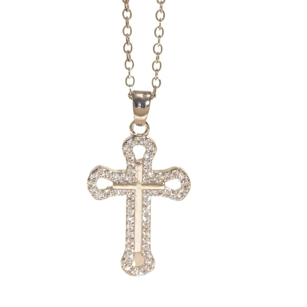 Gold electroplated copper cross necklace with micro inlaid zircon on a 41-50cm O-ring chain.