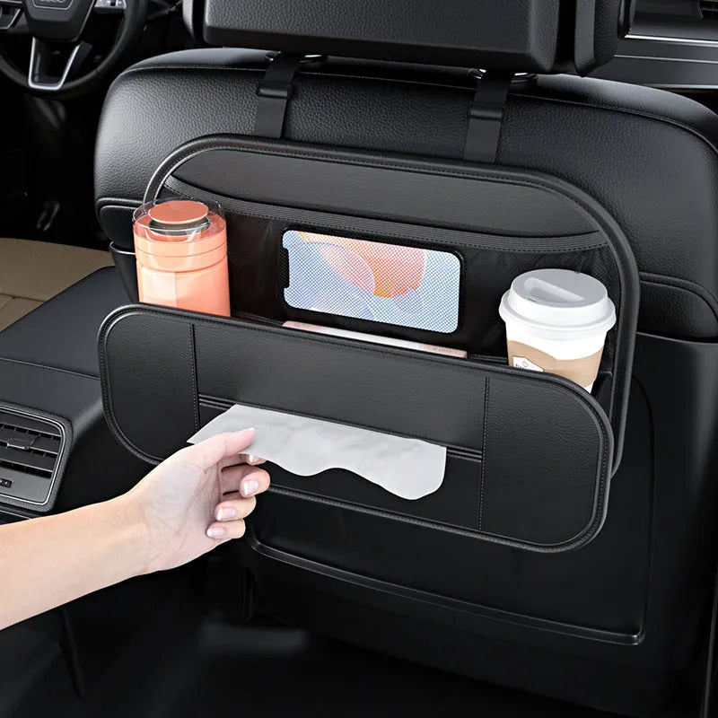 Black leather car seat rear storage bag with adjustable compartments mounted on vehicle seat