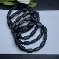Natural black tourmaline bracelet with Seiko-treated beads approximately 9mm diameter