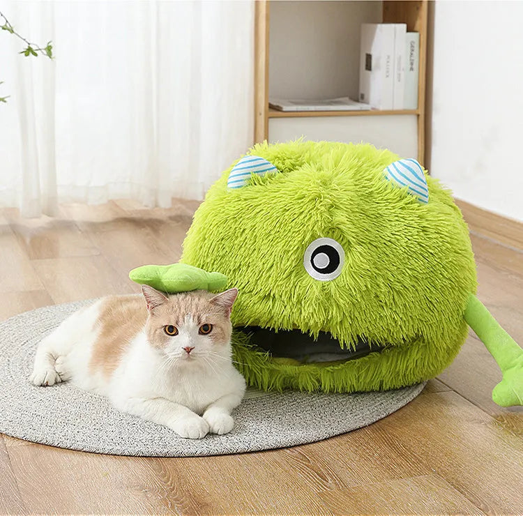 A round, fluffy plush cat bed with a non-slip base, shown in three size options for small, medium, and large pets.