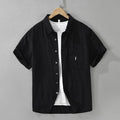 Women's loose-fitting lyocell cardigan top in black, short sleeve design for casual wear
