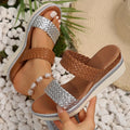 Gold women's wedge sandal with PU upper and rubber sole, shown from the side.