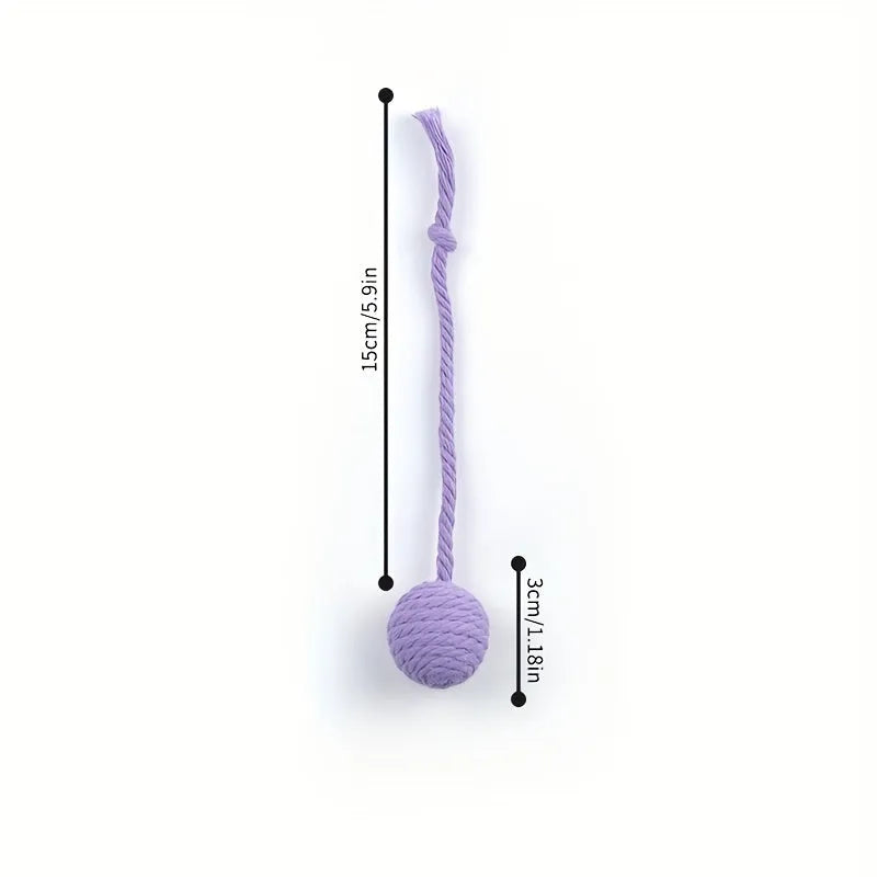 Cat toy ball with rope attached in green, pink, purple, or yellow colours with internal bell