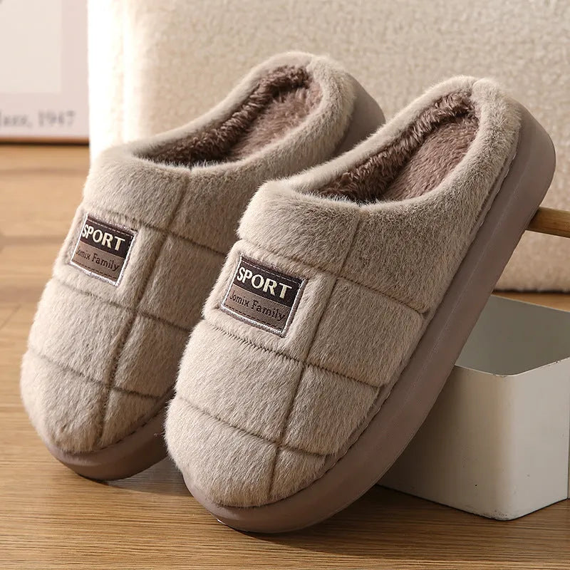 Men's plaid rabbit hair slippers with thick EVA sole and artificial wool lining in brown colour.