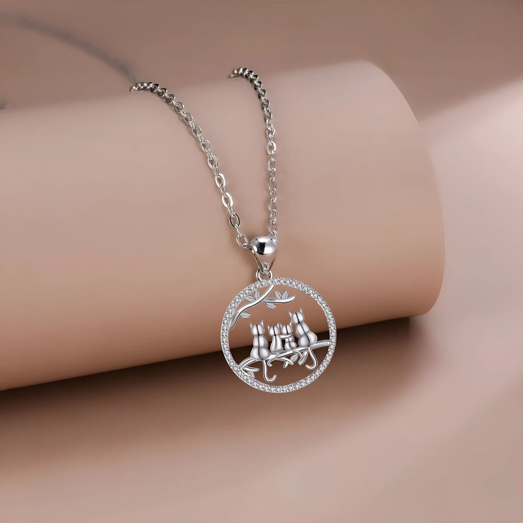Four kitten necklace with copper electroplated pendant and cross chain style jewellery