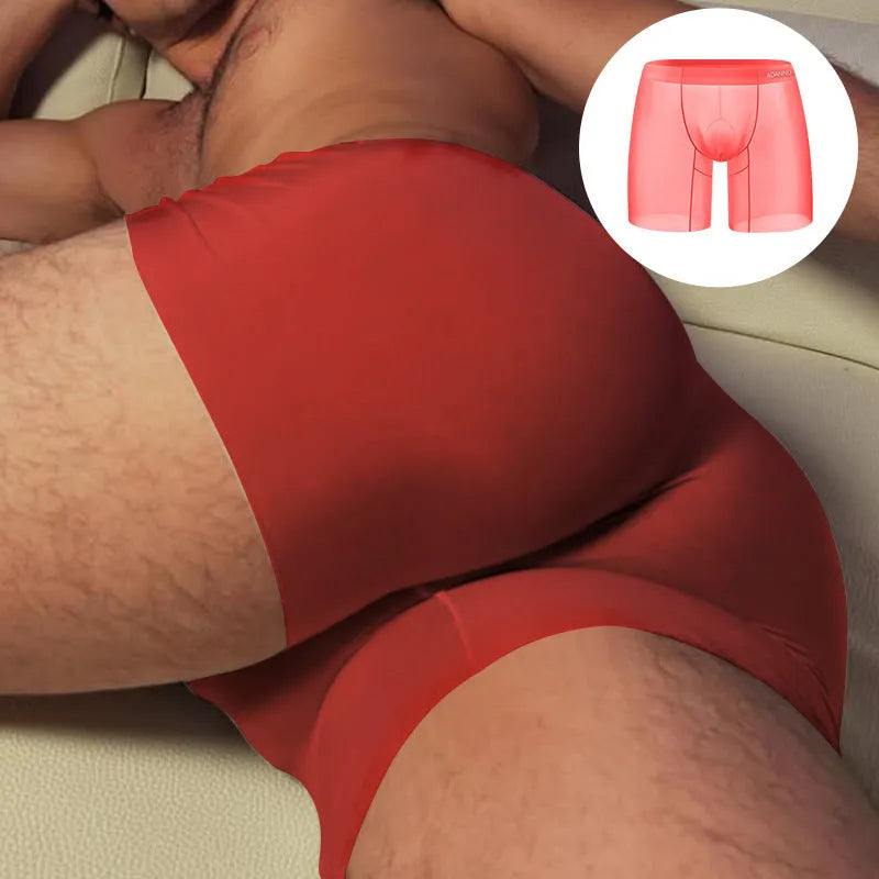 Men's seamless boxer shorts in orange colour showing low-waist design and body shaping features