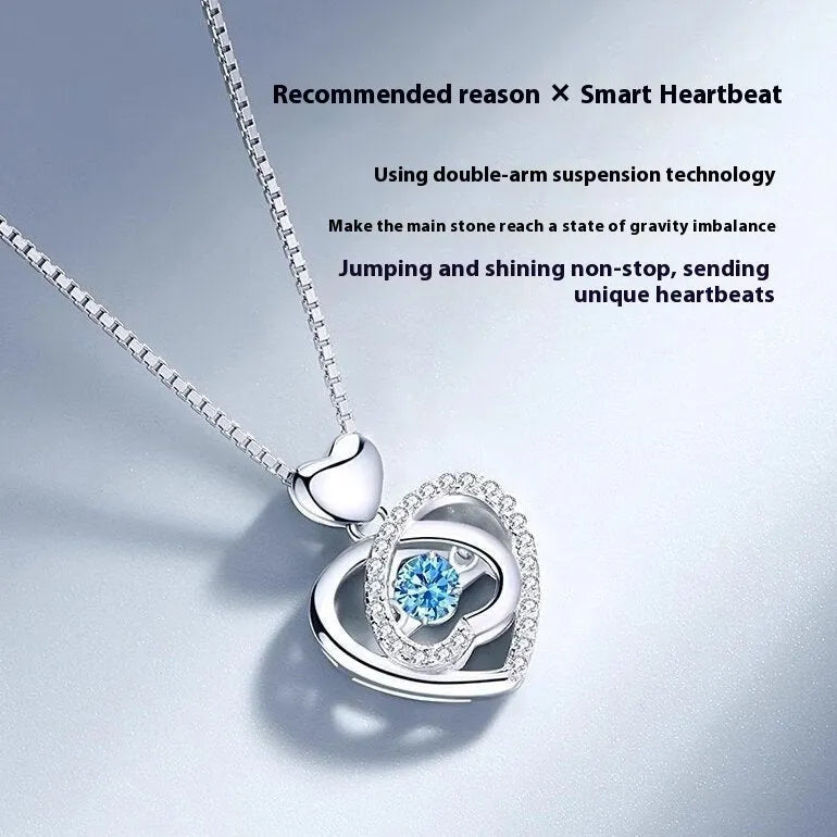 Blue electroplated heart pendant necklace and matching bracelet set with geometric design and gem inlaid detail