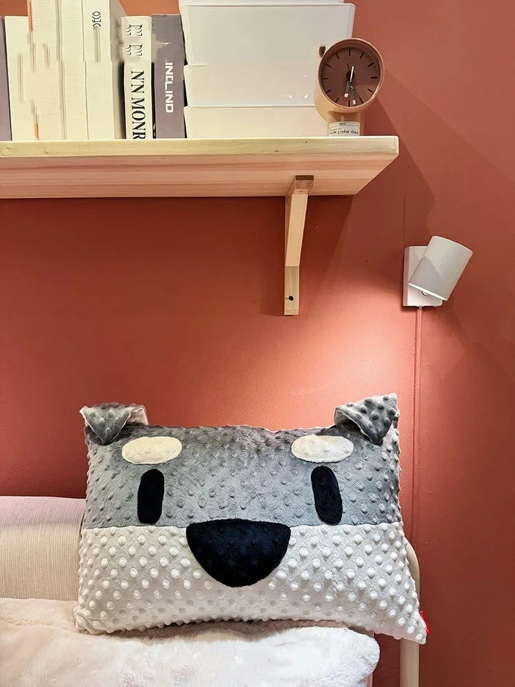 West Highland puppy dog pillow on sofa, grey and white dog-themed design, 50cm length