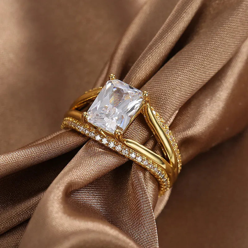 Gold geometric women's ring with square zircon stone shown in European simple luxury design